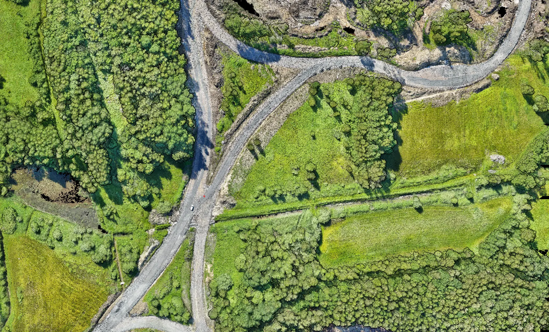 Ortofoto över väg och terräng från drönarinspektion